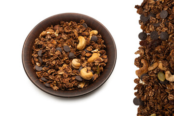 Chocolate granola cereal with nuts background.