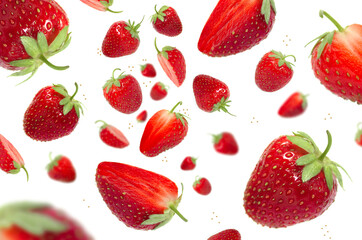 Strawberry levitation on a white isolated background. Whole pieces of strawberries and cut