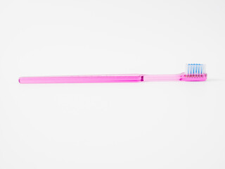Toothbrush with copy space on white background.
