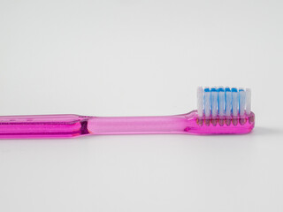 Toothbrush with copy space on white background.