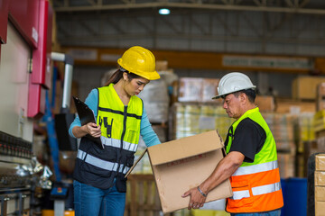 African American worker working in warehouse. Industrial and industrial workers concept. worker woman order details and checking goods and Supplies.