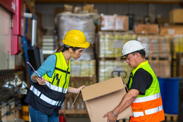 African American worker working in warehouse. Industrial and industrial workers concept. worker woman order details and checking goods and Supplies.
