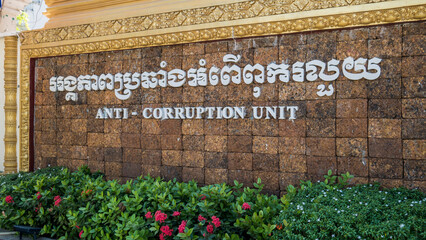 Sign at the entrance to the Anti-Corruption Unit in Phnom Penh