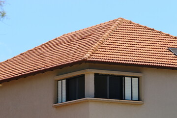 Red tiled roof on a residential building in Israel