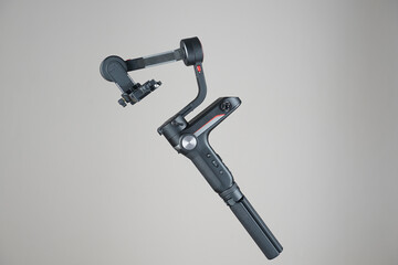 Gimbal stabilizer with grey background  