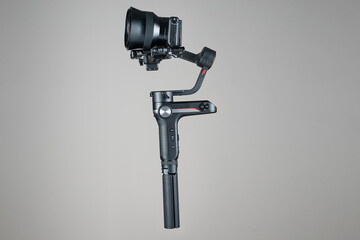 Fototapeta premium Gimbal stabilizer with grey background 