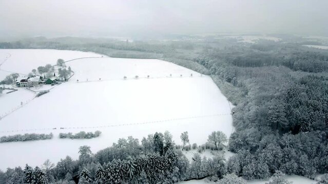 Snowy Winterberg Schwelm Droneshot turn to Woods