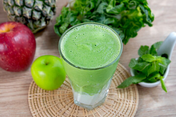 colorful healthy fresh fruit smoothy with assorted ingredients serve in glass.