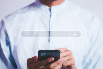 close up hand using mobile phone with searching bar icon