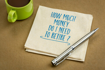 How much money do I need to retire? Finance and retirement planning concept, handwritten question on napkin with coffee.