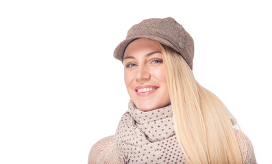 Young joyful woman in winter clothes on a white background.