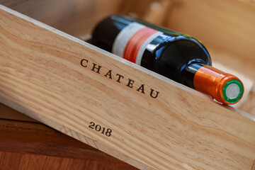 Wine bottle in a wooden box