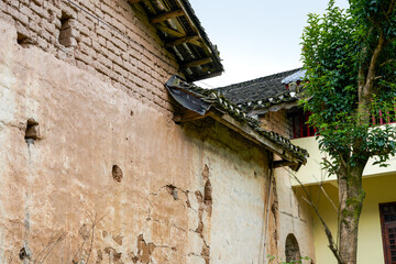 Fototapeta premium Close up of old mud brick house in rural China