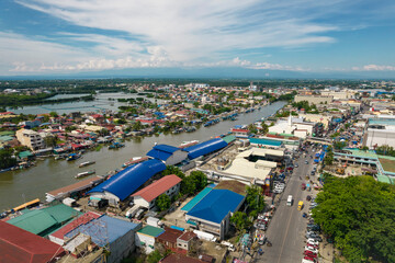 Dagupan, Pangasinan, Philippines - Aerial view of the fish market along Pantal River and the city...