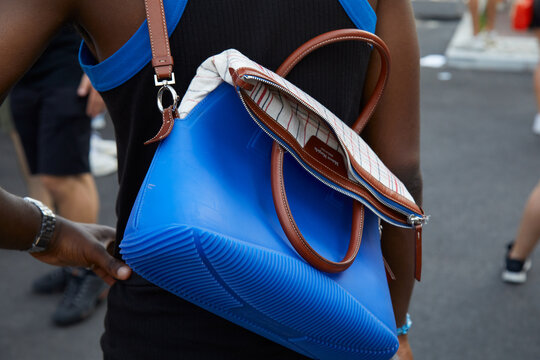 Man with Maison Margiela bag on June 17, 2022 in Milan, Italy