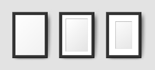 Realistic Rectangle Empty Wall Photo Frames set. Vector vertical black picture frame mockup template with shadow on gray background. Mockup for poster, banner, photo gallery, painting, presentation.