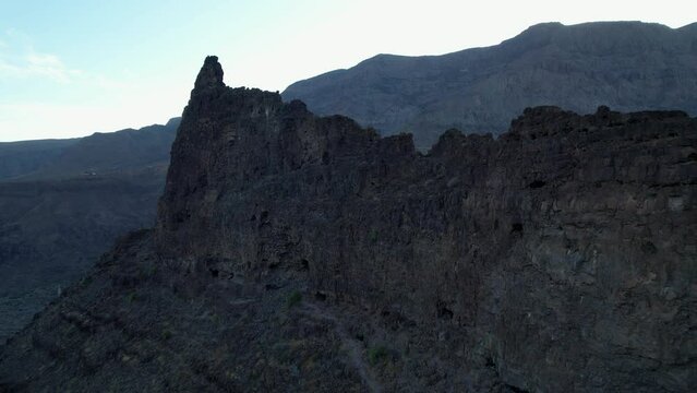 Ansite Fortress. Aerial shot through the wonderful Ansite Fortress on the island of Gran Canaria. Ancient Aboriginal caves are found inside. Monument recognized by Unesco.Santa Lucia, Spain