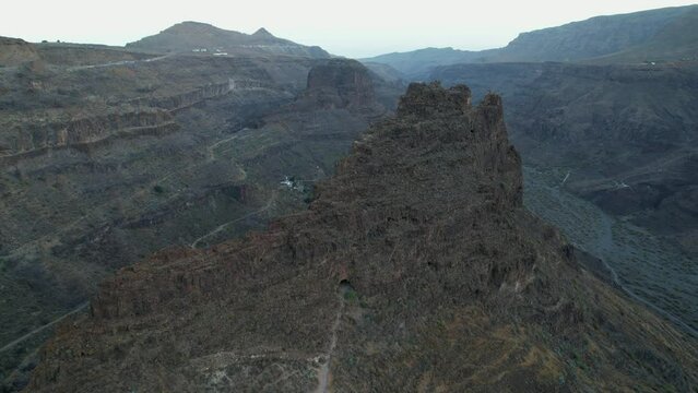 Ansite Fortress. Nice aerial shot of the Ansite Fortress on the island of Gran Canaria. Ancient Aboriginal caves are found inside. Monument recognized by Unesco. 4k