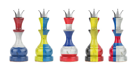 Chess queens in the colors of the flag of different countries. Isolated on a white background. Sport. Politics. Business.