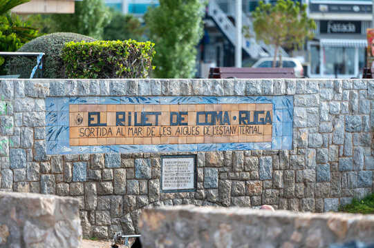 People in the hot springs at the Riuet on the Comarruga beach in Tarragona, Spain.
