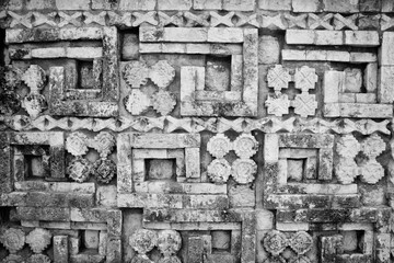 Closeup grayscale shot of the Mayan art sculptures in Yucatan Peninsula, Southeastern Mexico