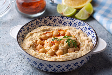 Hummus, chickpea on plate, traditional delicious Turkish food (Turkish name; Humus)