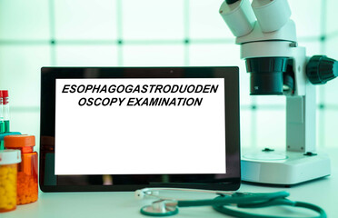 Medical tests and diagnostic procedures concept. Text on display in lab Esophagogastroduodenoscopy Examination