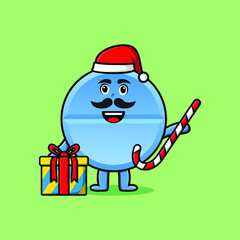 cute cartoon pill medicine santa clause character is bringing candy cane and boxes christmas illustration  