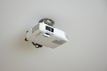 Video projector is installed on the ceiling for presentations