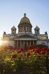 Fototapeta na wymiar St. Isaac's Cathedral in the summer in the sunset warm rays of the sun