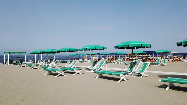 Forte dei Marmi beach, Italy with chairs and umbrellas - Steady shot