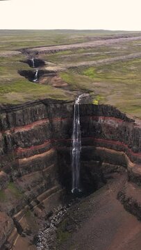 Vertical aerial footage of the fantastic Hengifoss waterfall in Iceland