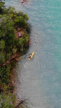 Vertical drone footage of the kayak boat on Marlborough Sounds, New Zealand