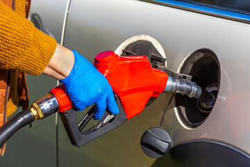 fuel price increase - Refueling a close-up car