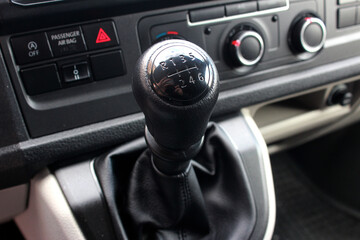 Six speed gear shift in car . Gear transmission. Manual gearbox handle in the car