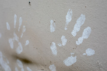 handprints on wall