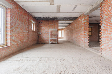 interior of the apartment without decoration in gray colors. rough finish