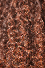 Curly woman hair. Afro hairstyle background. Beautiful brown long wavy haircut, close up. - 515461478
