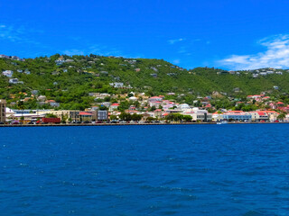 Naklejka na ściany i meble View of green coastline at one of the US Virgin Islands.