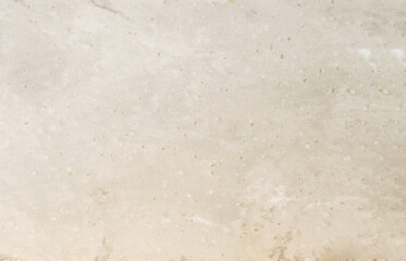 The background and texture of marble stone is light brown. Modern minimalist background