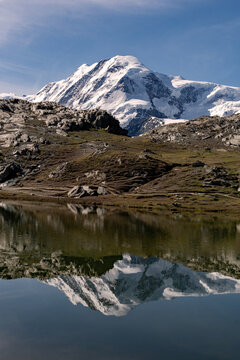 Mountain of the Alps reflecting on the water of the Riffelsee Lake near Zermatt, Switzerland 
