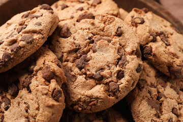 Many delicious chocolate chip cookies, closeup view
