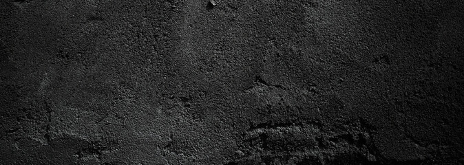 Fototapeta Black wall scary or dark gray rough grainy stone texture background. Black concrete for background. obraz