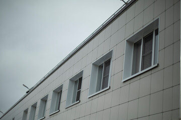 Building in city. Urban architecture. View of city during day.