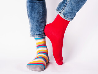 Men's legs and bright socks. Without shoes