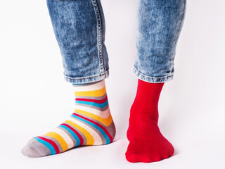 Men's legs and bright socks. Without shoes