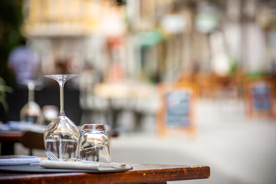 Close Up of Glasses on a Table in the Street Waiting for Tourists in Summer, Italy