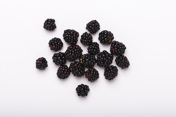 Fresh blackberries on a white background, top view