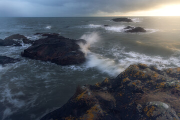 Waves crashing on rocks