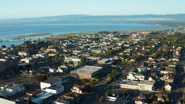 Aerial view of Eureka California urban center with Pacific Ocean in background